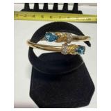 14k bangel bracelet w/pear shaped blue topaz