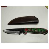 Demascus steel hunting knife w/ multicolor carved