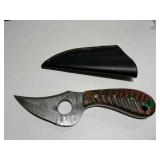 Skinner knife w/finger hole and multicolor carved