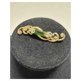 14K diamond scrollwork brooch w/peridot stone