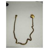 10k pocket watch chain with a disc shaped button