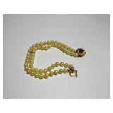 14K double strand pearl bracelet w/ flower clasp