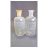 (2) Antique Embossed Glass Apothecary Bottles