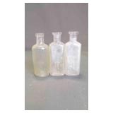 (3) Antique Embossed Glass Apothecary Bottles