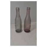 (2) Antique Embossed ARTESIA Bottling Co