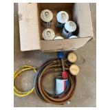 HVAC Guage and 7 Cans of 134A