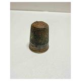 Very Very, Old Thimble-has 2 holes at the tip
