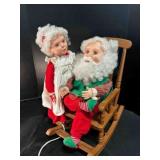 Santa & Mrs. Claus kissing Santa Plays music-she
