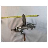 Antique cast iron cherry pitter
