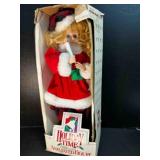 Animated Christmas Girl w/candle-music plays,