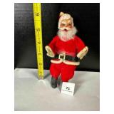 6ï¿½"Rubber faced Santa, felt suit, wire in arms