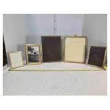 5 gold-tone metal picture frames