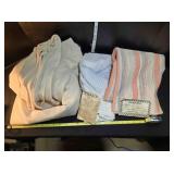 9 larger pieces of polyester cloth
