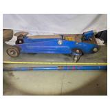 Hydraulic floor roller jack, works
