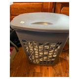 Hamper full of plastic hangers