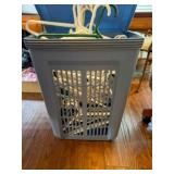 Hamper full of plastic hangers