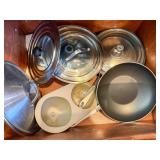 drawer of misc. fry pans, 1 cast iron, grease