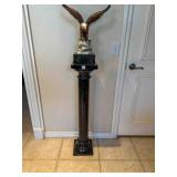 Marble pedestal 39' tall; Mable base eagle is 18'