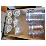 6-clear glass mugs and 2-plastic canisters