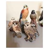 box of wood birds or prey