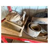 Shelf Contents: Lawn and Garden tires, hose