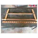 vintage hand saw and yard stick