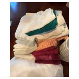 Bathroom towels and white trash can
