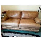 Leather Hide A Bed Sofa 70"x40" has some staining