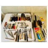 Utensil Drawer-Knives, mesuing spoons, nut cracker