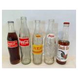 2 Cocs cols bottle in different language, Nehi, Pe