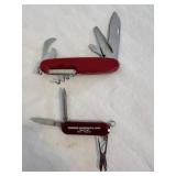 2 Red Swiss Army style pocket knives