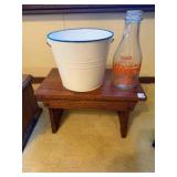 small wood seat, small metal milk bucket,