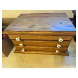 vintage 4-drawer spool cabinet with porcelin knobs