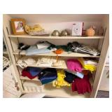 Contents of closet upstairs, ladies hats,