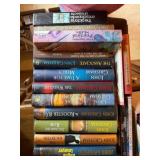 box of John Grisham and other books