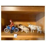 vintage cast iron pig, cow, and a wind up toy