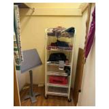 contents of front closet by entrydoor,
