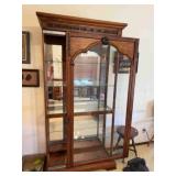 Walnut front sliding door glass lighted cabinet;