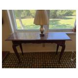 Wood hall table; 16" x 52" x 29"; and table lamp;