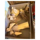 box of paper figurines