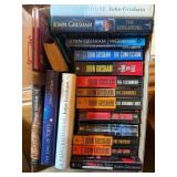 box of John Grisham and other books