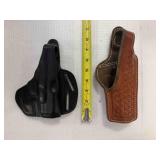 Box of pistol holsters and magazine holders