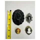 4 Cameo Brooches, Black Lucite has been repaired,