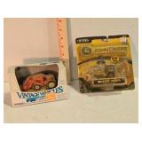 2 ERTL vehicle models in original packaging