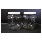2 Glass Storage Bottled Jars w/ Metal Covers