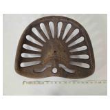 McCormick cast iron implement seat, antique