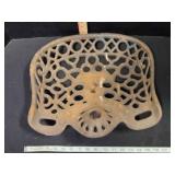 Antique cast iron implement seat, 15"x15"