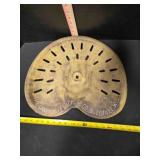 Antique cast iron implement seat, 16" wide