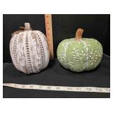 2 decorative pumpkin-shaped household items