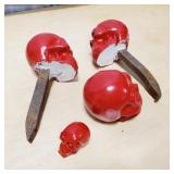 Lot of RED Cement Skulls